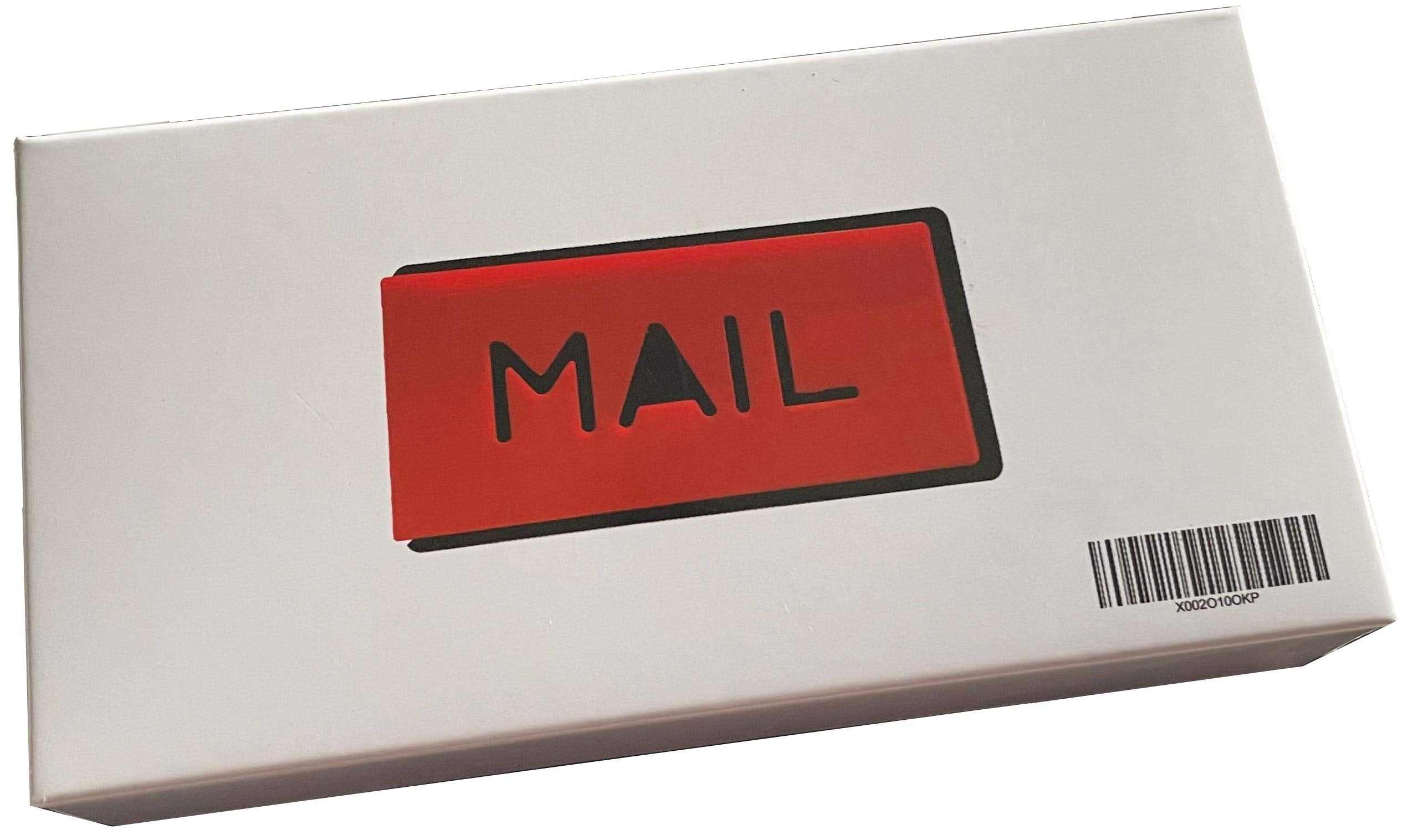 Cartener mailbox flag next to ruler size comparison confirming compact 3.9x2 inch fit