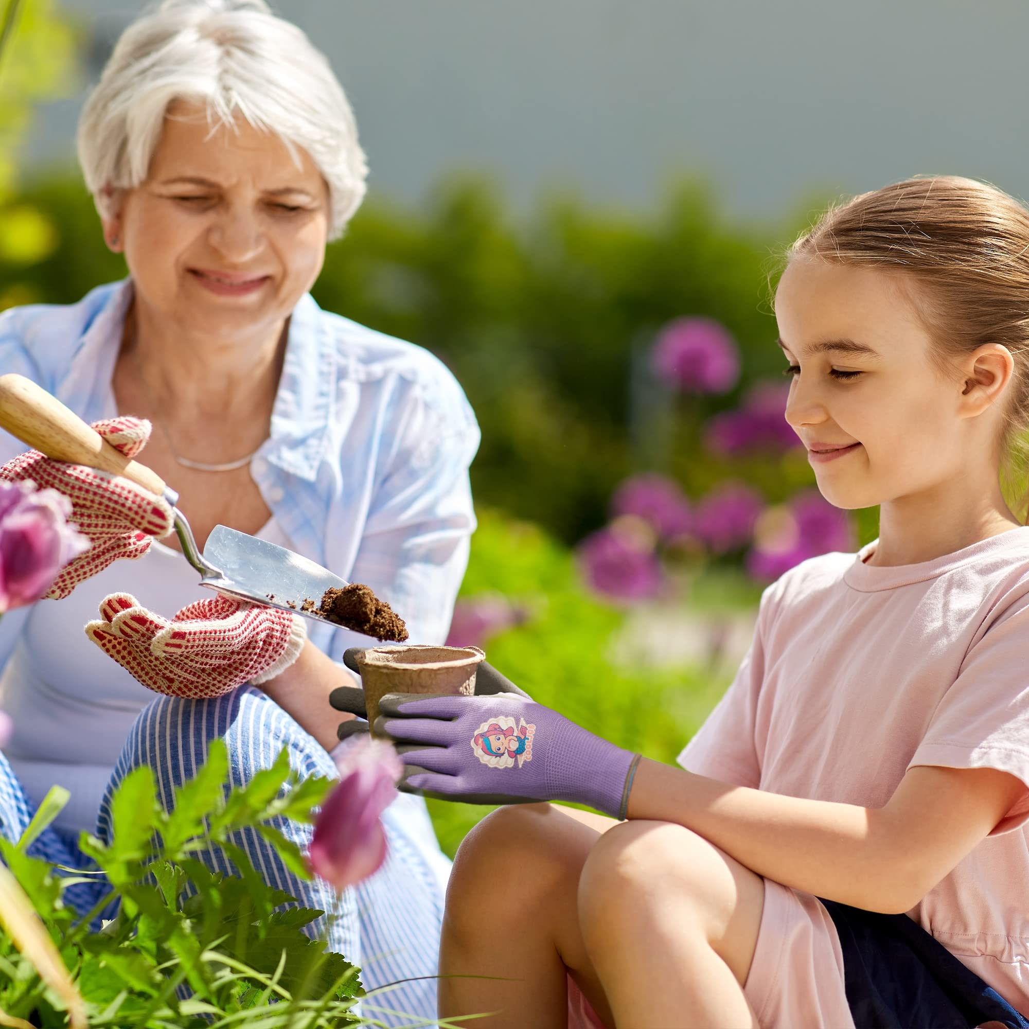 COOLJOB child wearing gloves while planting showing safer grip