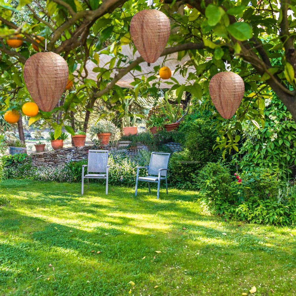 DECYOOL decoy in patio setting illustrating non-toxic deterrent for outdoor comfort