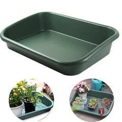 Defemim front view of green potting tray showing rim and capacity benefit