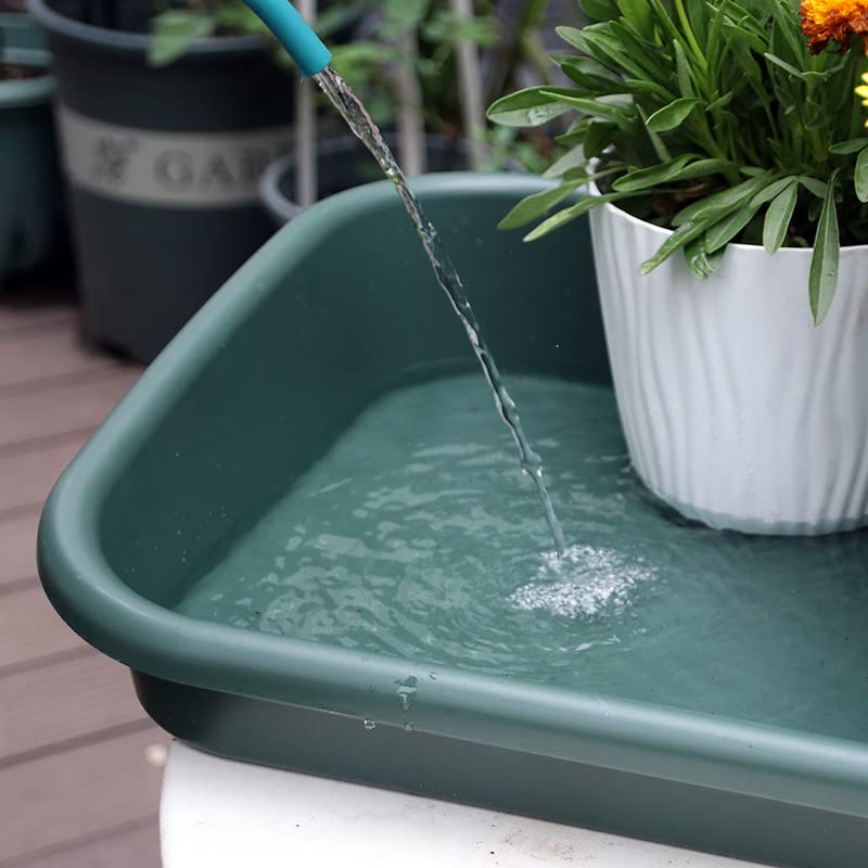 Defemim tray used for mixing potting soil showing tidy work surface benefit