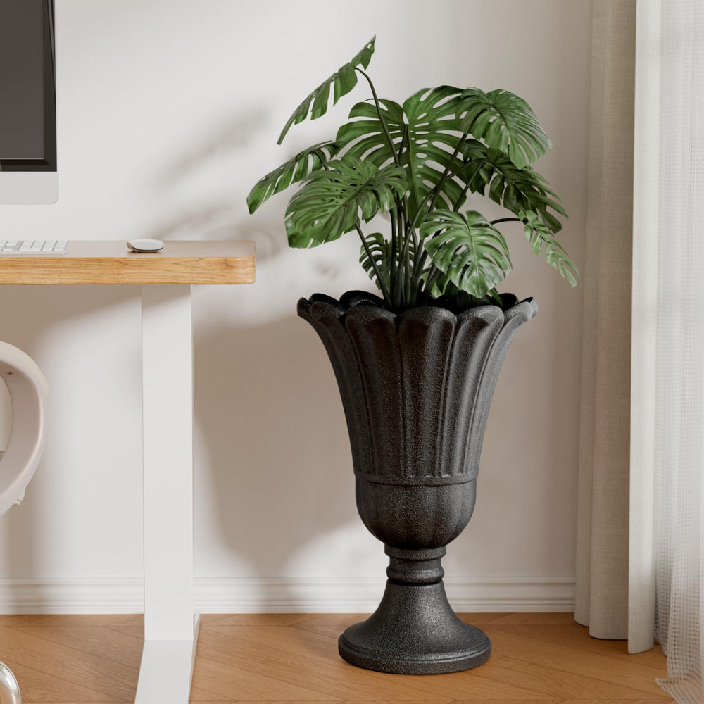 Diyfire urn used in living room adding height and sculptural greenery