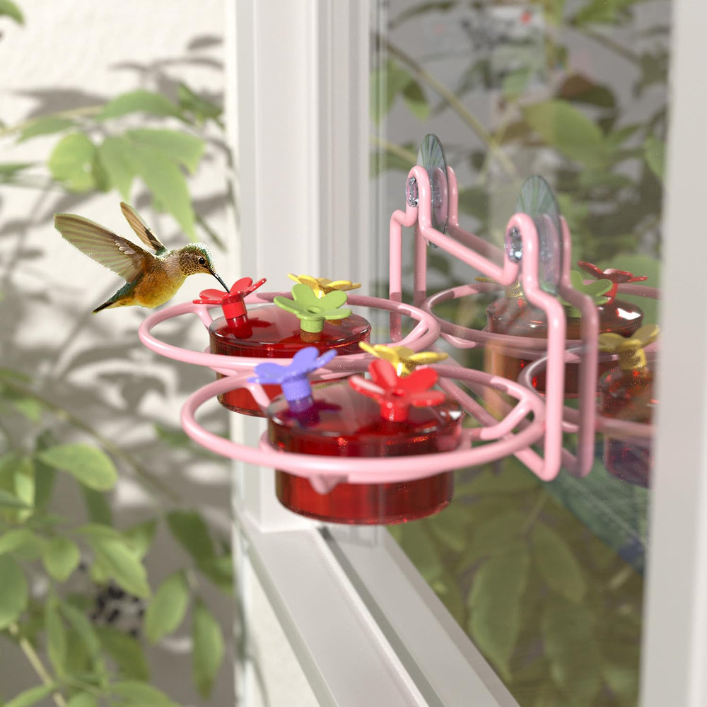 Dreamdrawer side profile of two clear 2-ounce bottles showing nectar level visibility and compact design