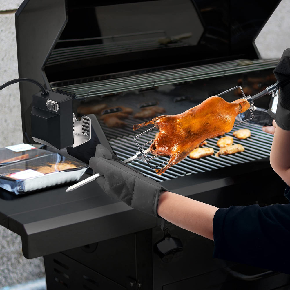 Dreyoo rotisserie installed on a backyard grill demonstrating even roasting