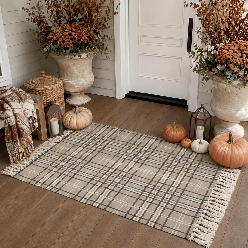 Dunzy front view of khaki buffalo plaid rug showing farmhouse welcome look