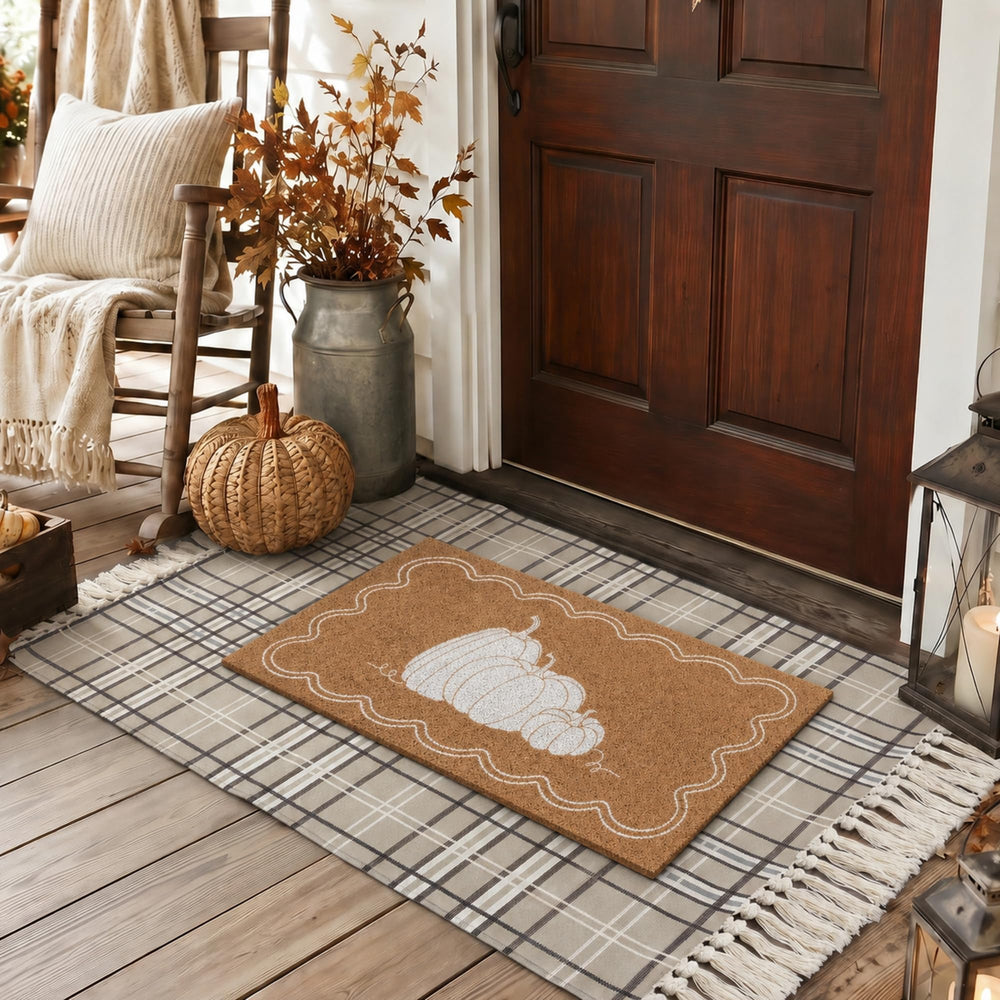 Dunzy rug beside a chair to show 28 x 43 inch scale and fit for entry
