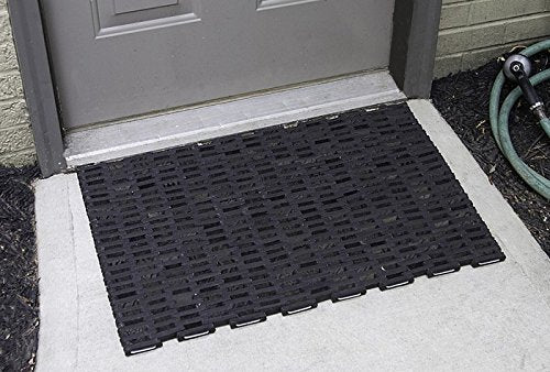 Durable Corporation Durite in a workshop showing durable traction and floor protection benefit