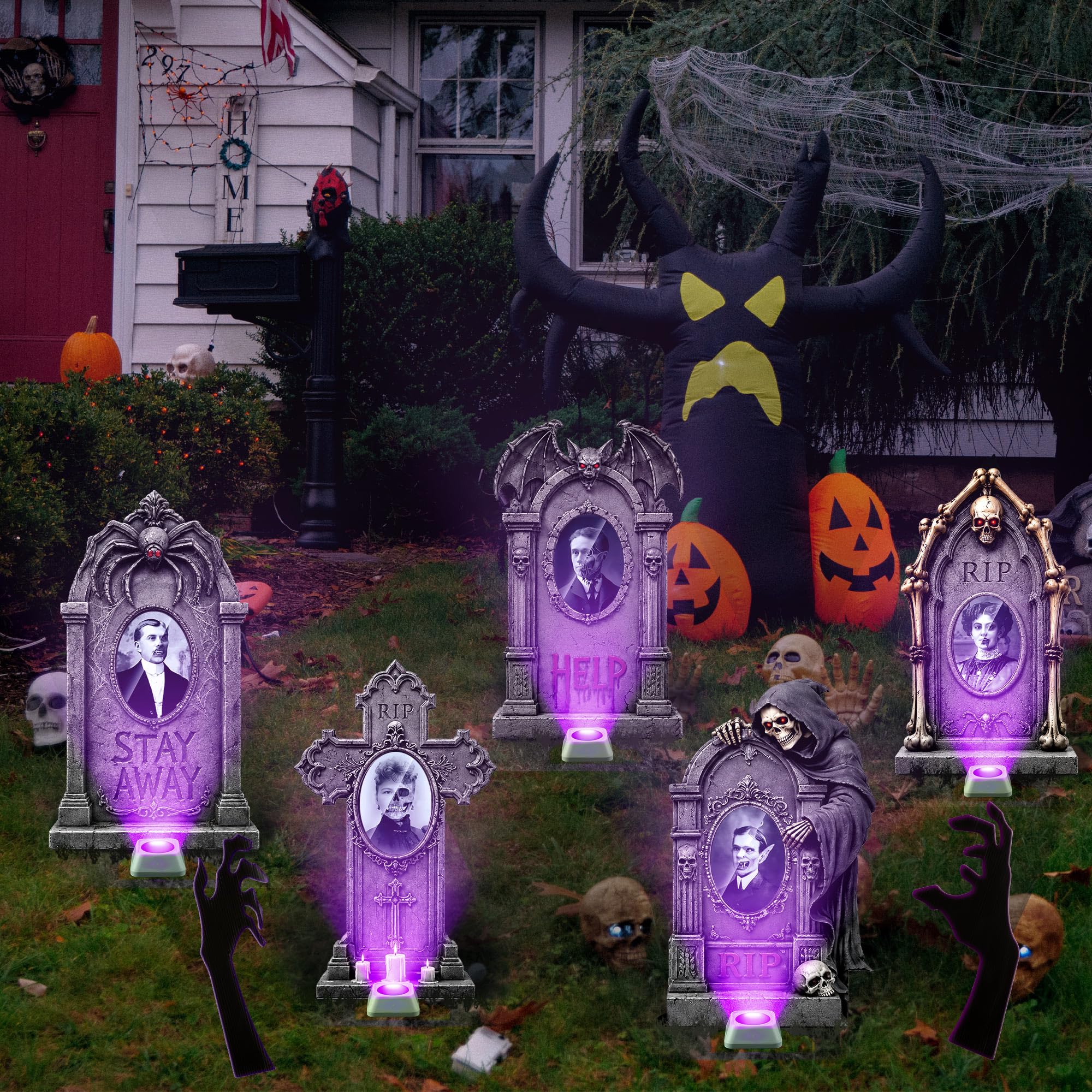 ElectricWise nighttime lawn display with colored lights creating haunted ambiance