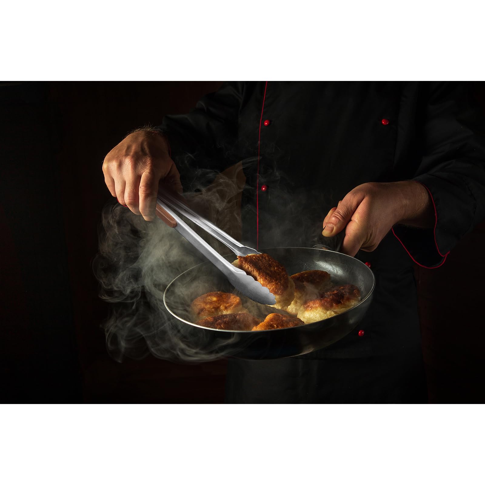 Esie Houzie 12" tong in skillet showing precise control while cooking