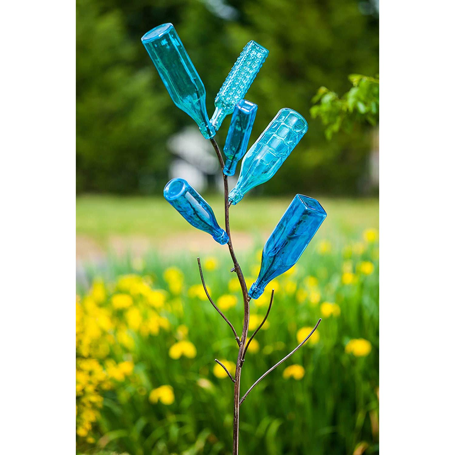 Evergreen Family Products bottle tree with colorful bottles demonstrating vibrant sunlight reflection