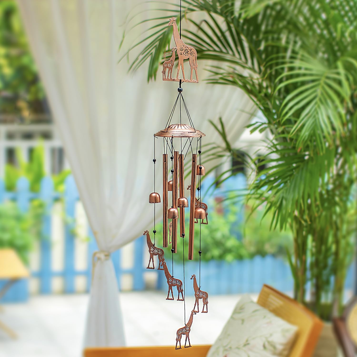 EZTZEN wind chime hanging in a garden showing natural ambiance and decoration