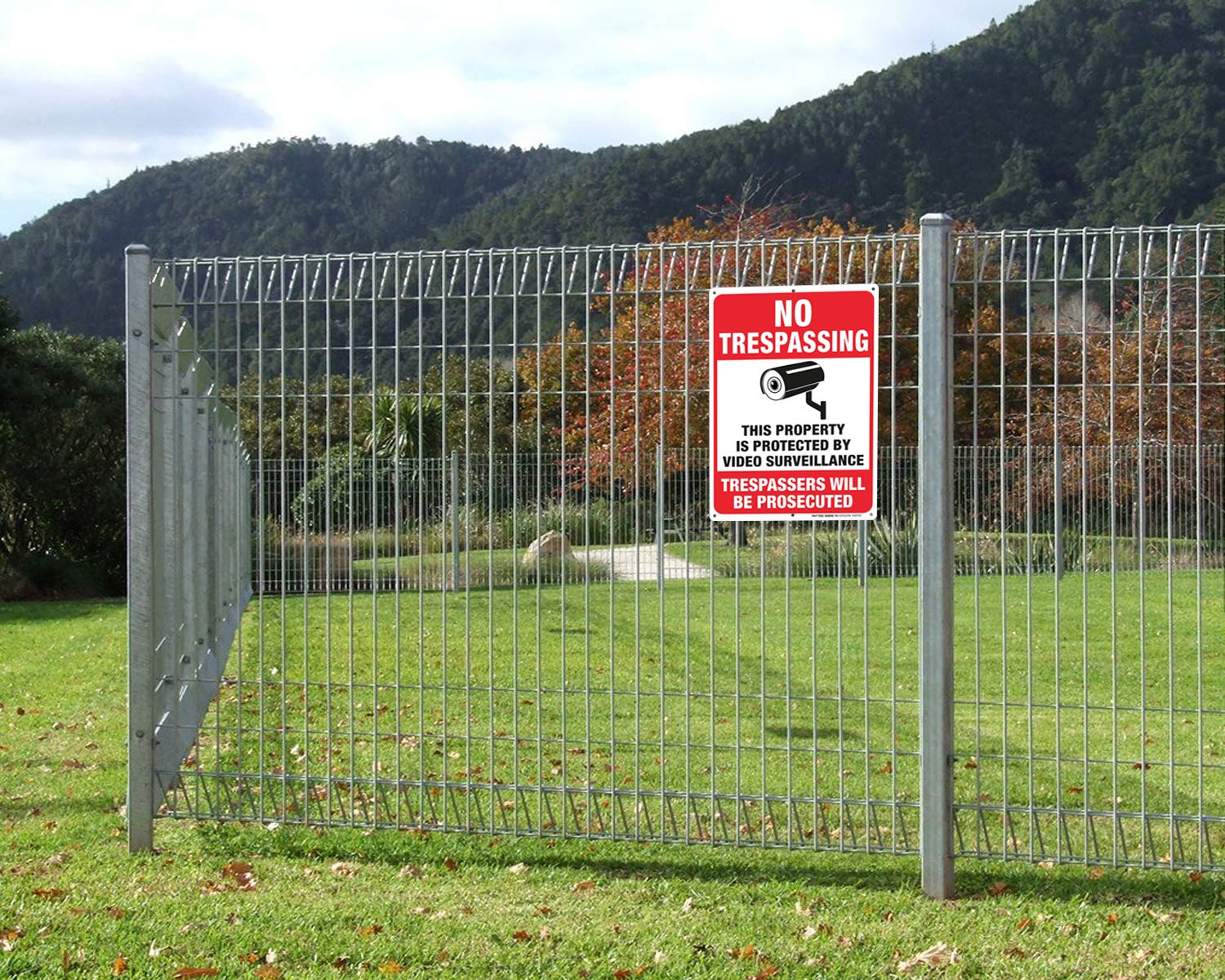 Faittoo installed on chain link fence marking monitored perimeter