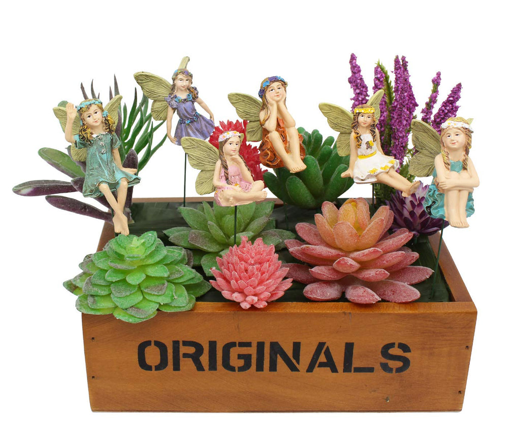 FANWNKI figurines placed in flowerbed adding whimsical outdoor interest