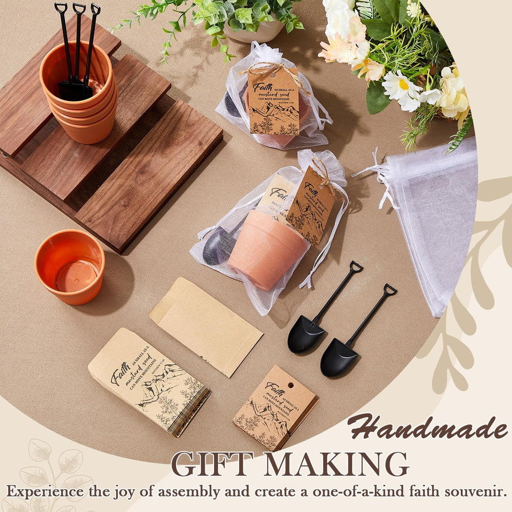 Ferrochef small terracotta-style pot with miniature shovel useful for planting