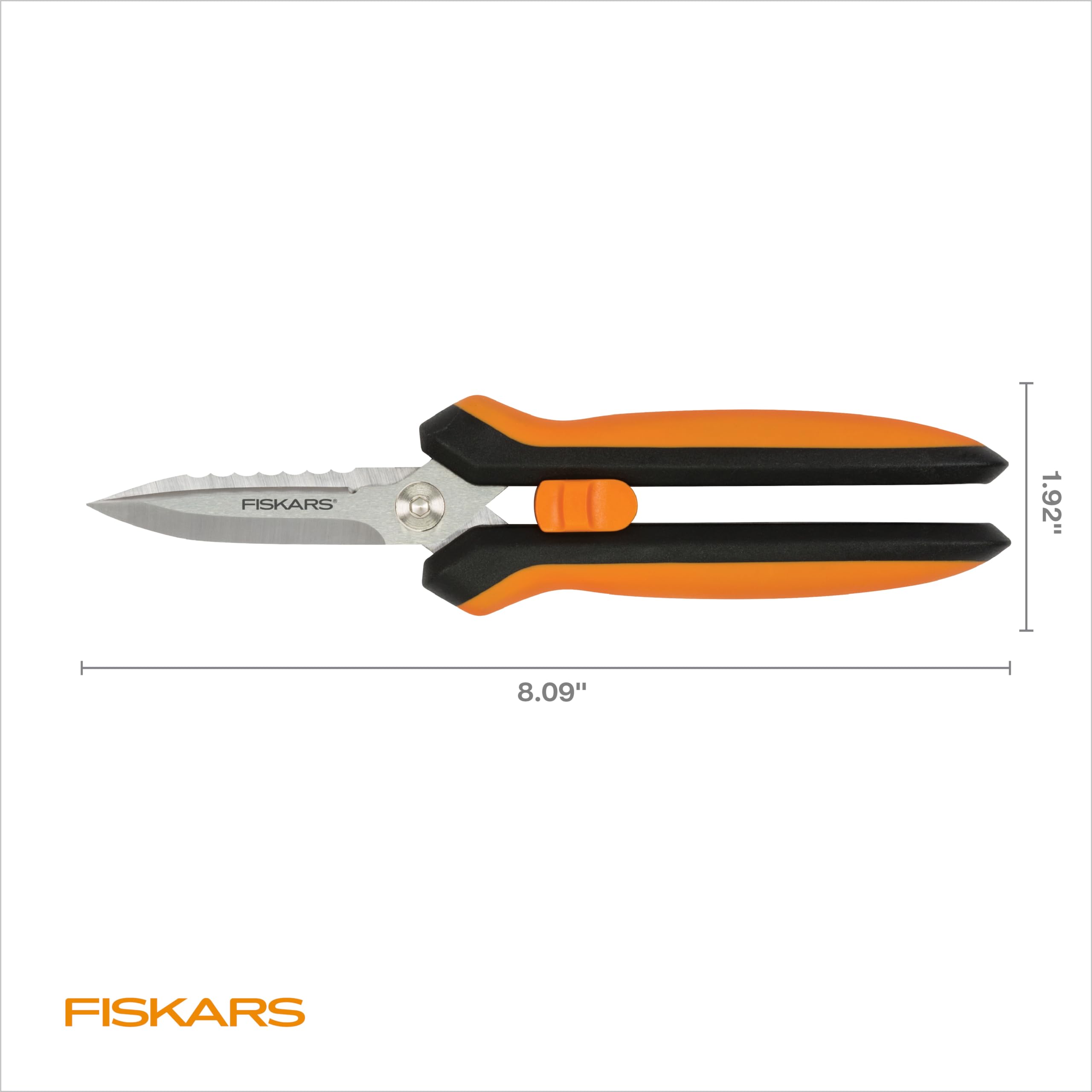 Fiskars shears in a garden setting, practical tool for everyday tasks