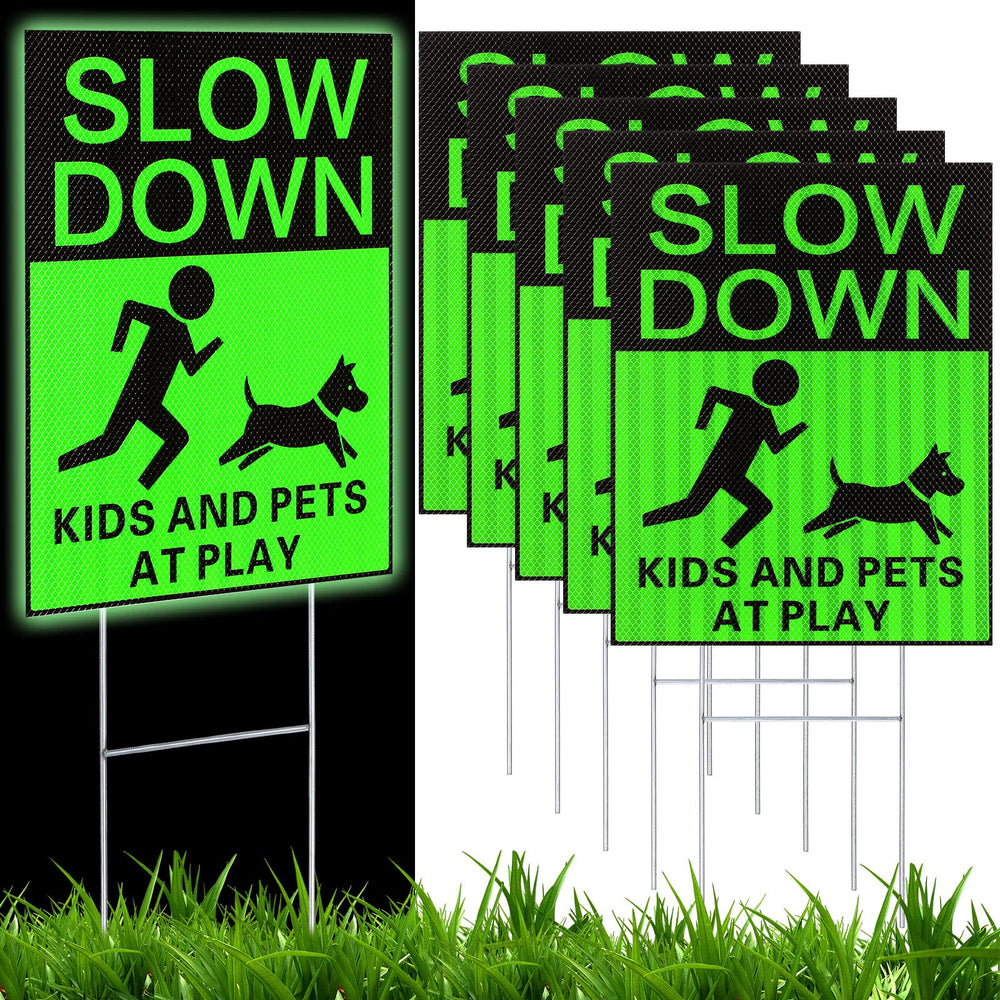 Fumete front view of six green slow down signs showing benefit of clear roadside warning