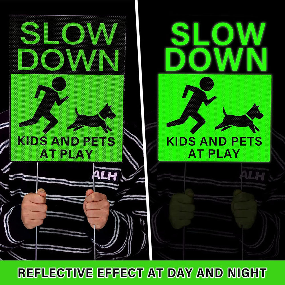 Fumete sign placed by driveway illustrating driver awareness and safer yard