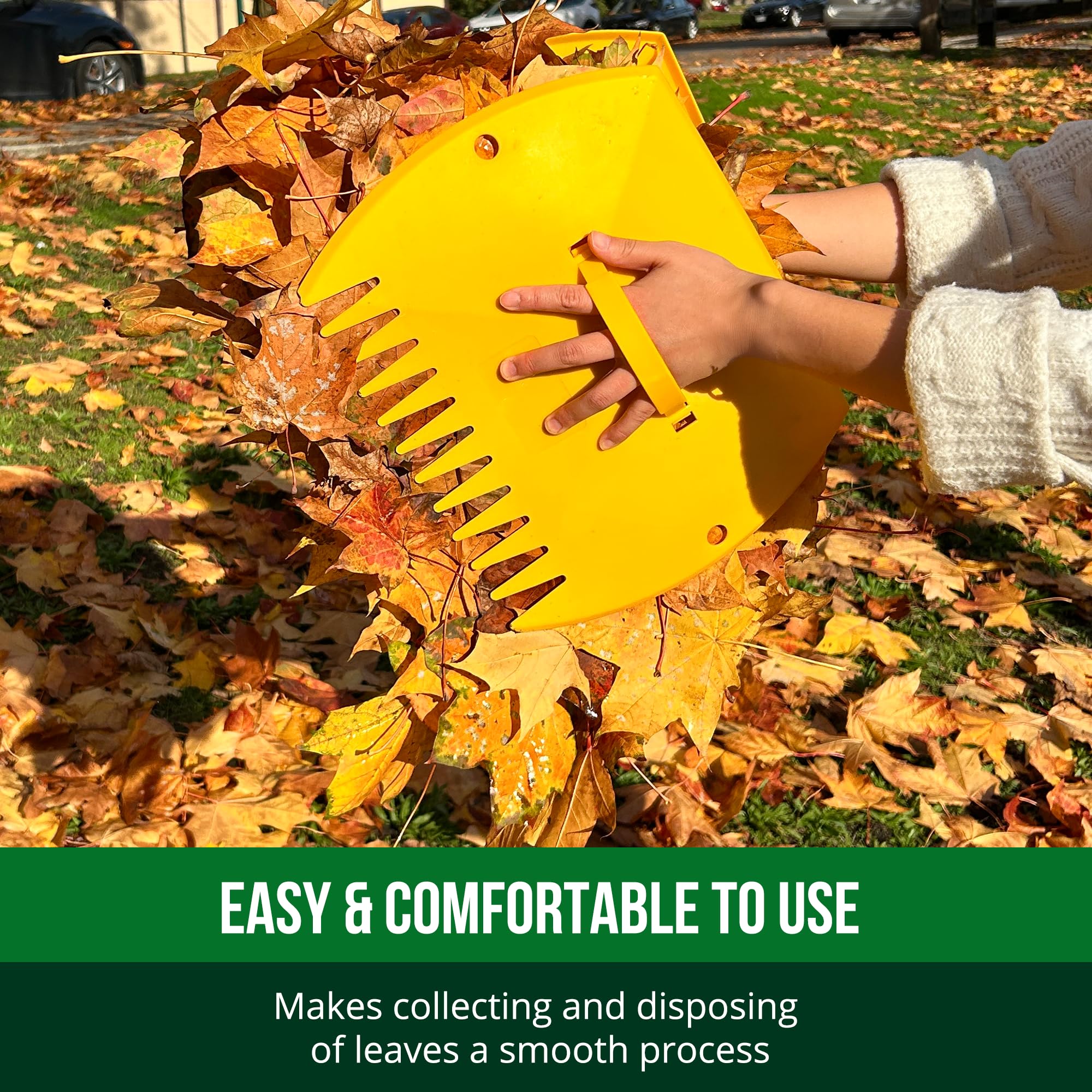 GardenHOME scoops placing leaves into bag for tidy transfer and less mess
