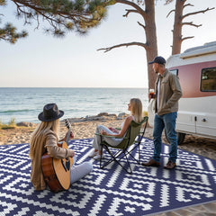 GENIMO rolled rug with strap showing compact portability for travel