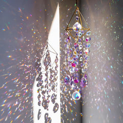 HDCRYSTALGIFTS front view of hanging prism catching sunlight and sparkles