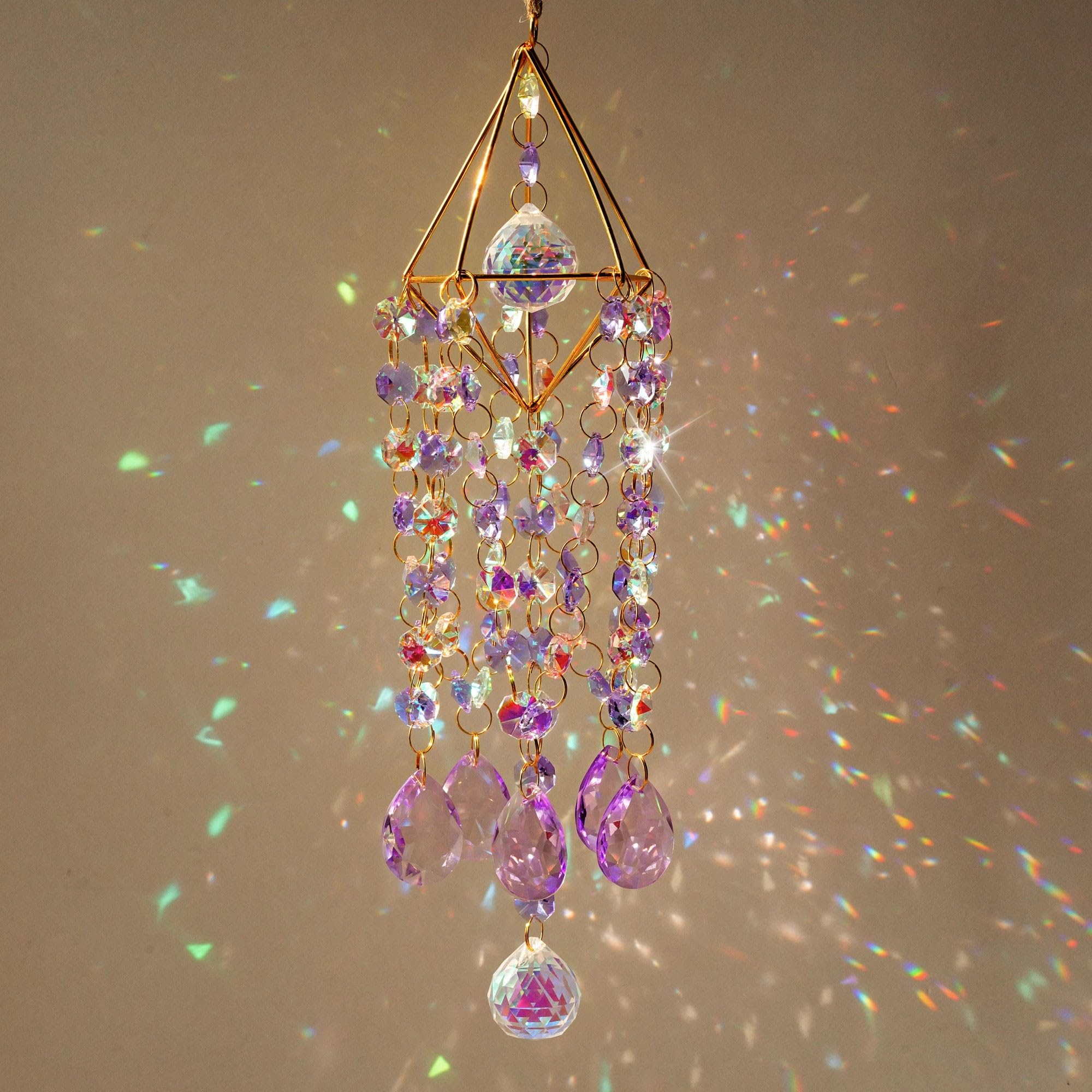 HDCRYSTALGIFTS suncatcher installed in window creating colorful accents