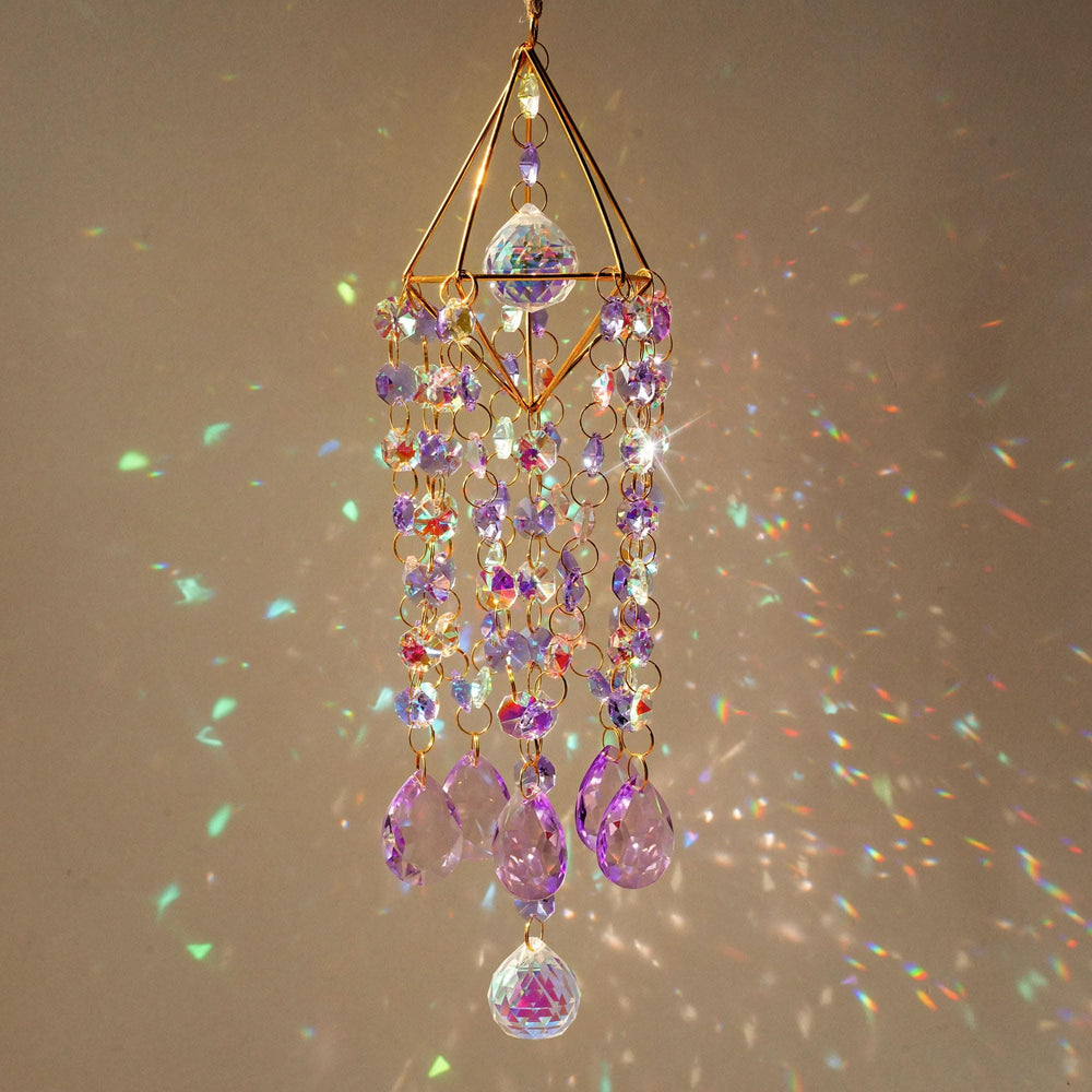 HDCRYSTALGIFTS suncatcher installed in window creating colorful accents