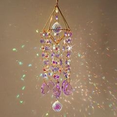 HDCRYSTALGIFTS suncatcher installed in window creating colorful accents