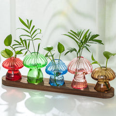 Hewory front view of five colored mushroom vases showing playful design and balance