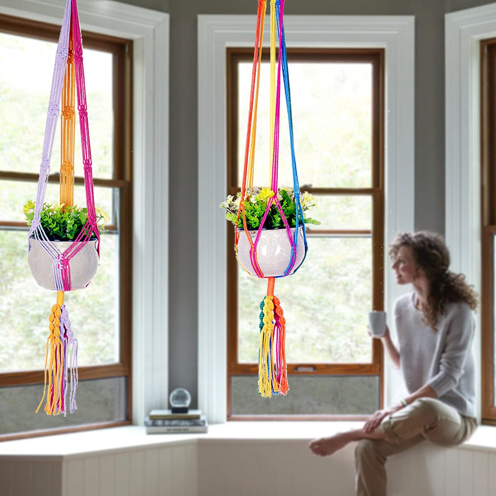 HOWMAX lifestyle living room with hung plants adding boho color and warmth