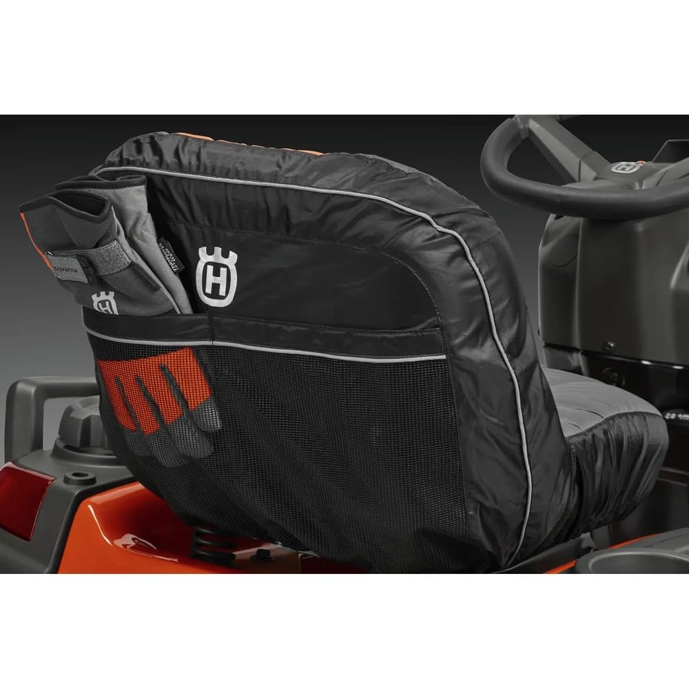 Husqvarna seat cover beside ruler showing fit for seats up to 15 inches