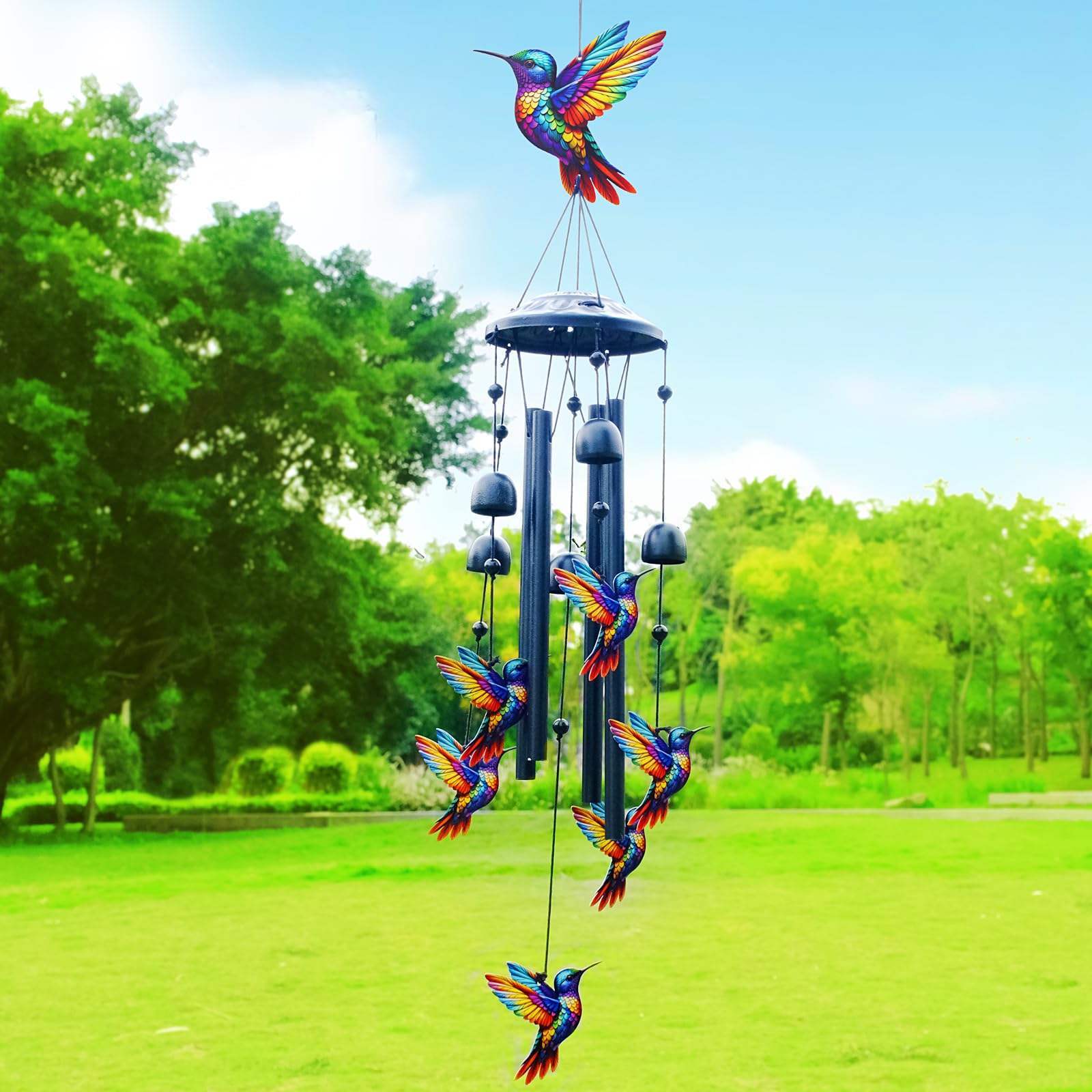 HUVNSOCH hanging from a tree branch illustrating scale and gentle movement benefit