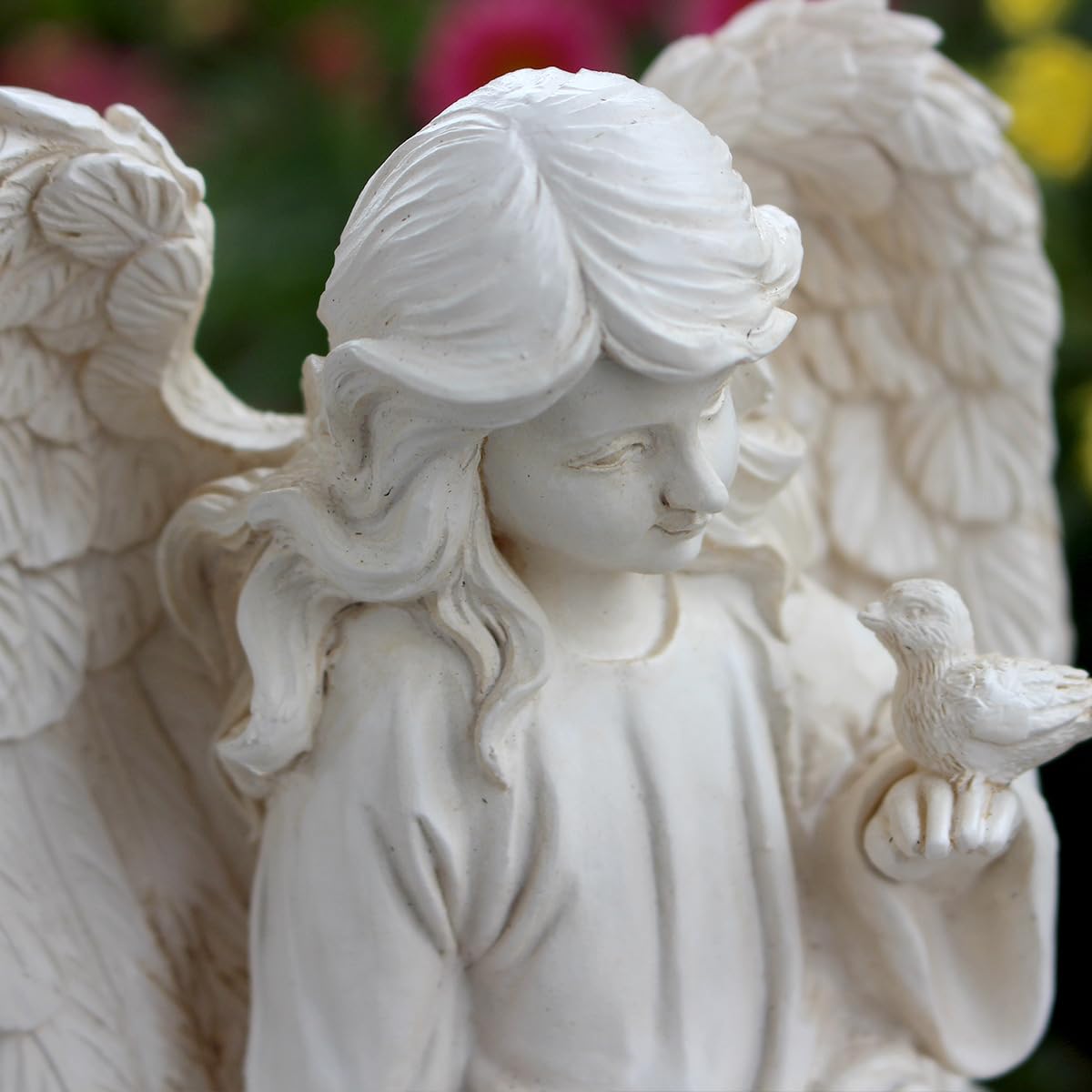 JARPSIRY hands holding bird figurine emphasizing gentle focal point and story