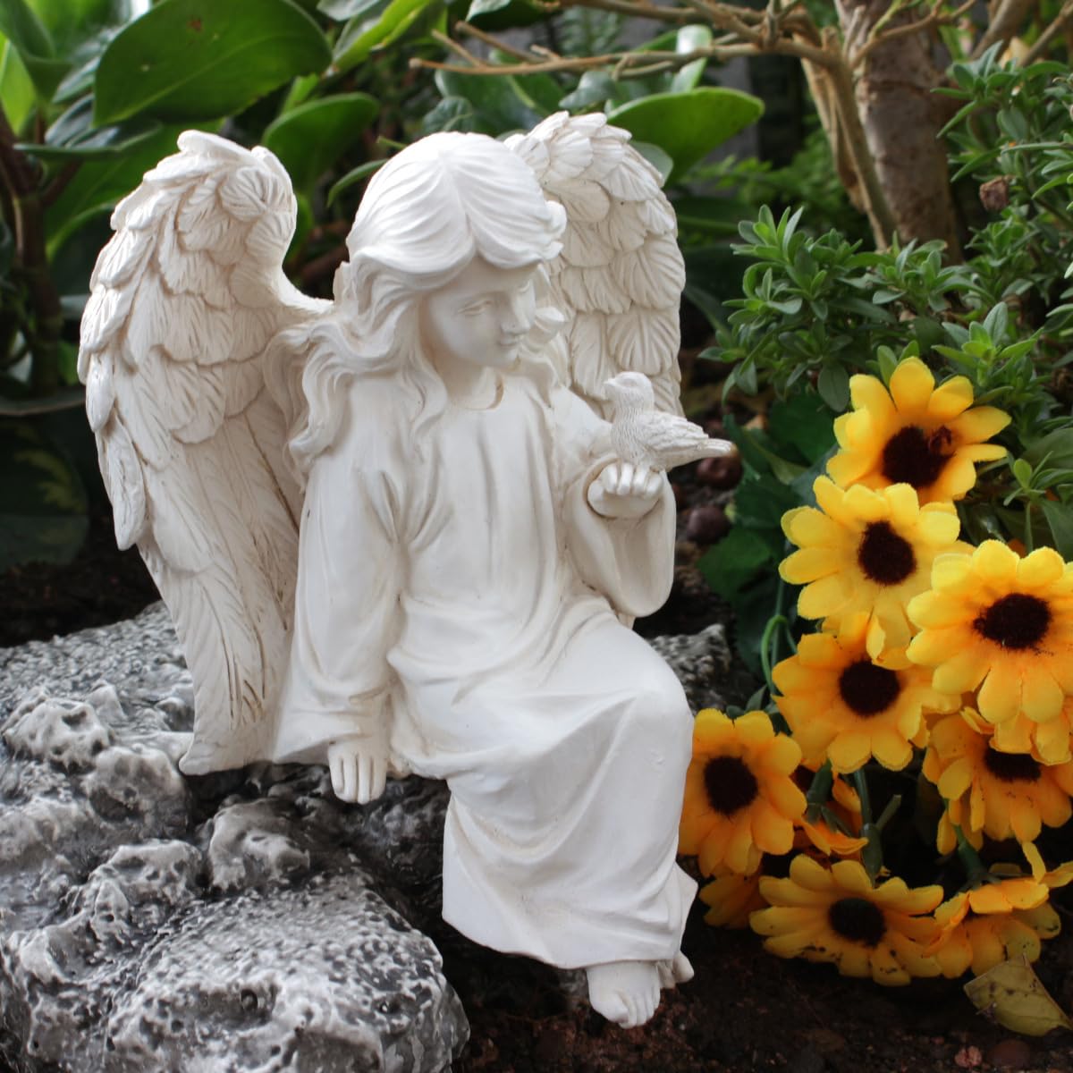 JARPSIRY angel placed among plants demonstrating garden integration benefit