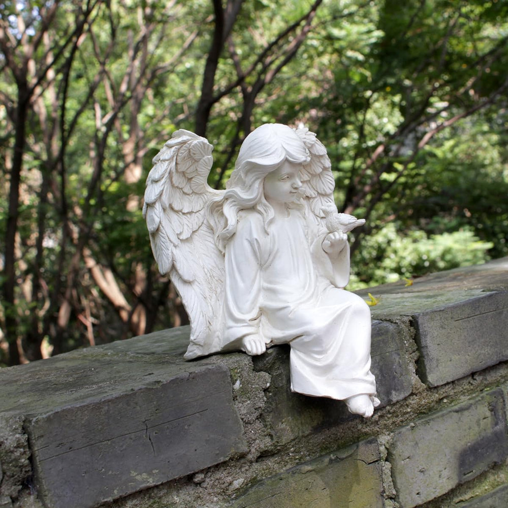 JARPSIRY statue beside flower pot for size comparison and placement help