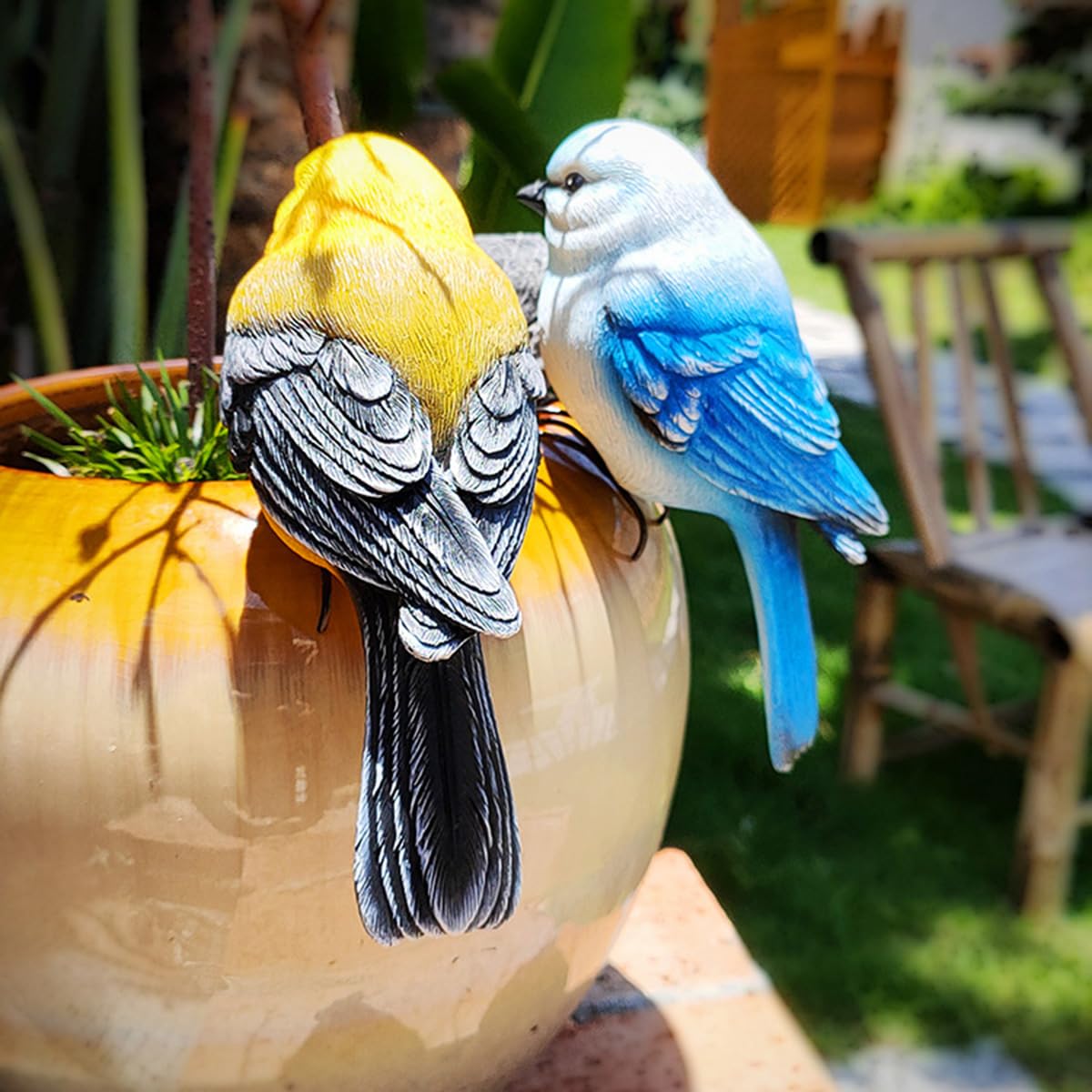 JARPSIRY perched on fence post adding garden focal interest