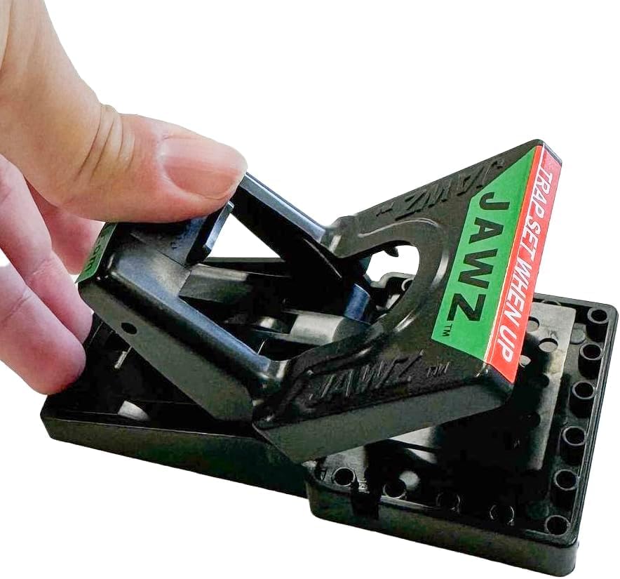 JT Eaton visible set indicator confirming trap is armed and safe