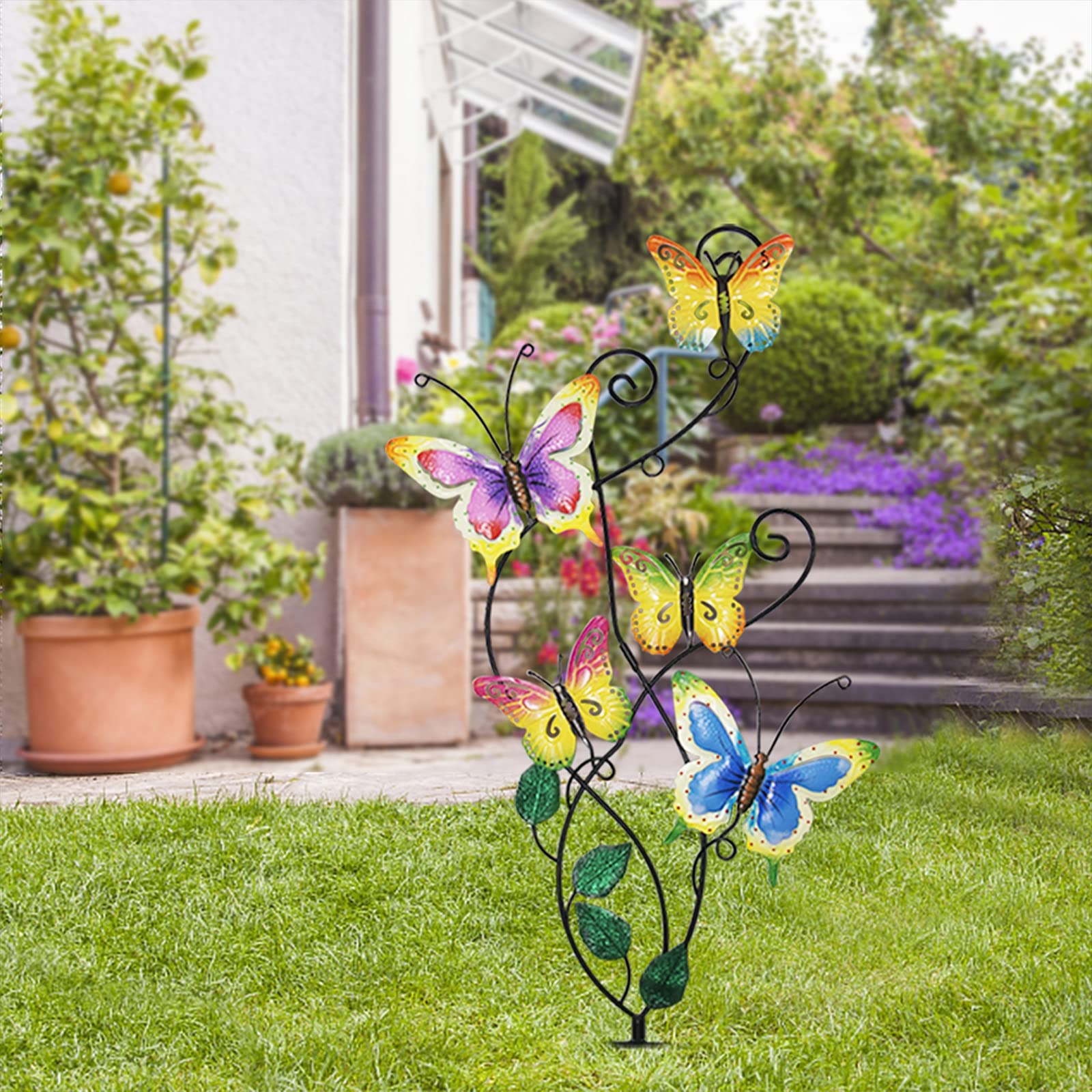 Juegoal trio of stakes in yard provides layered colorful landscaping