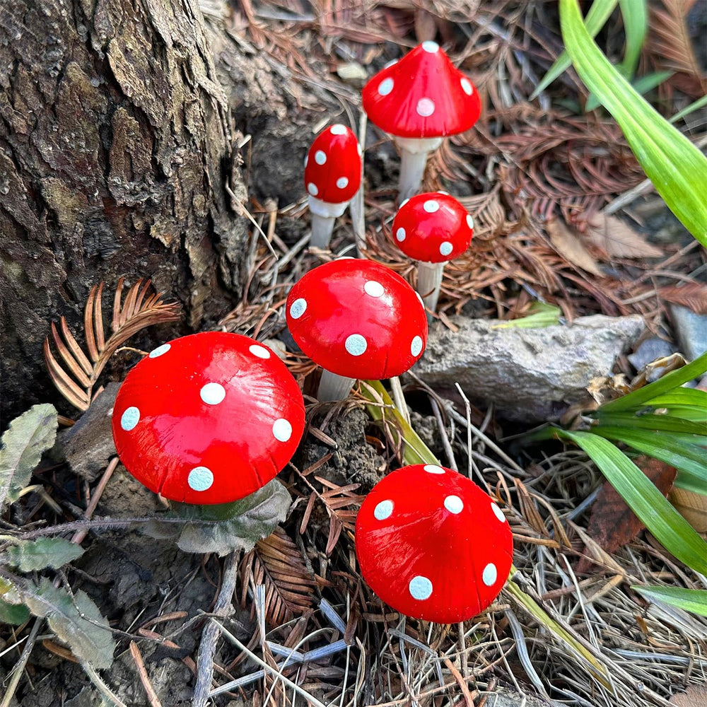 Juegoal mushrooms next to a fairy house showing decorative storytelling use