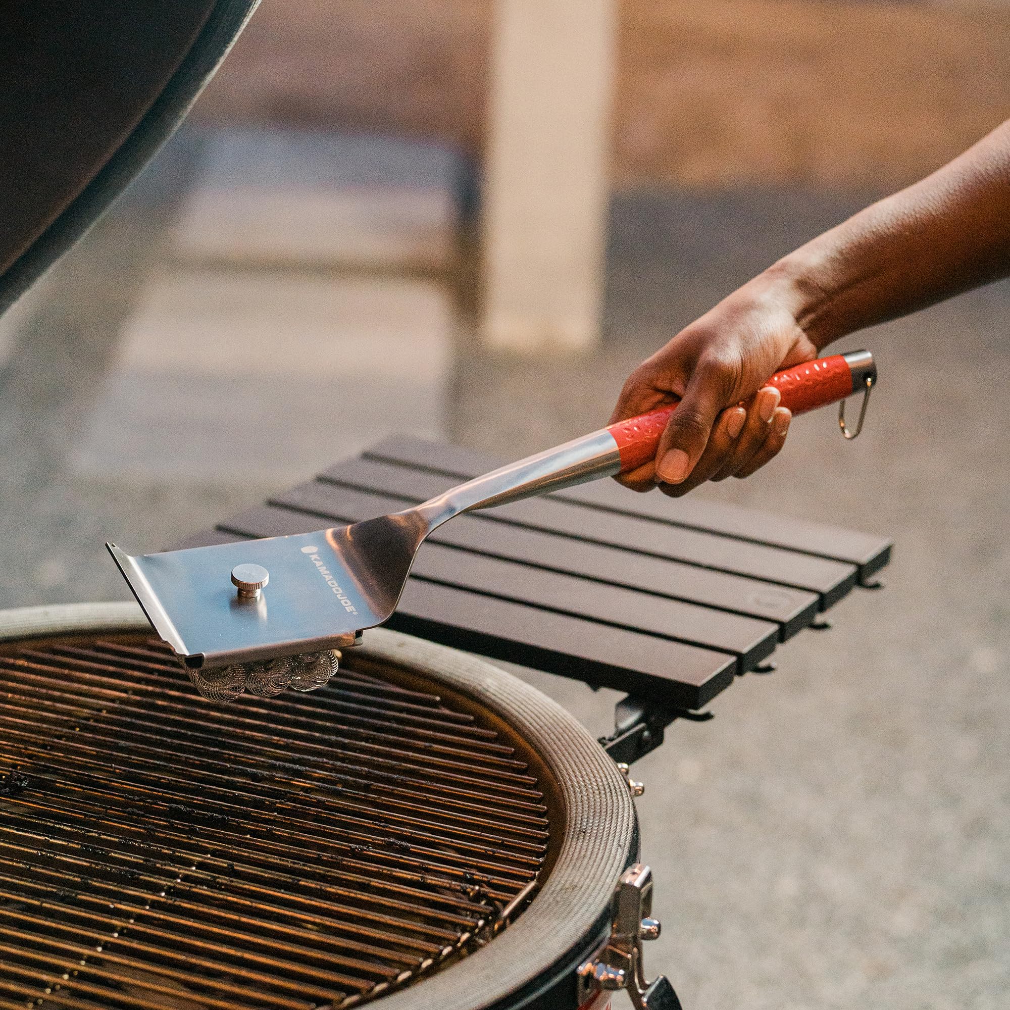 Kamado Joe replaceable brush head illustrating easy head swap and savings