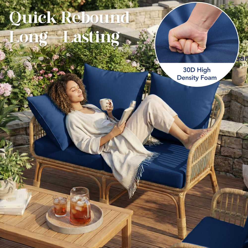 L'AGRATY cushions styled on a patio loveseat demonstrating comfortable seating