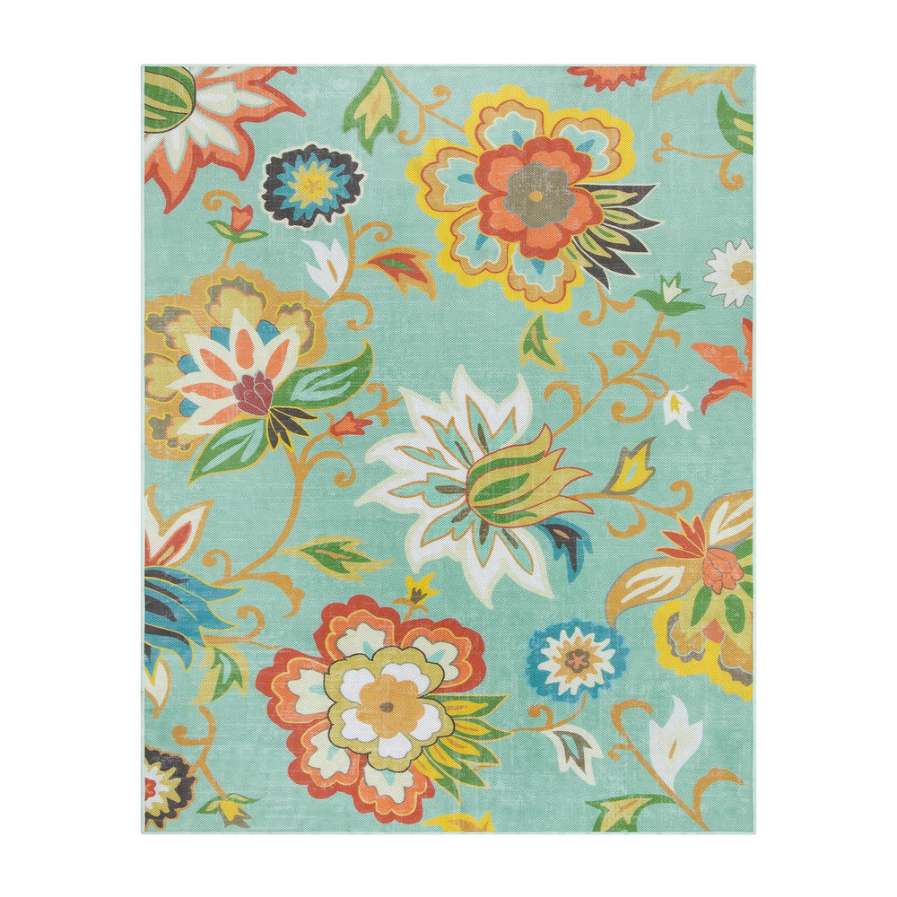 Lahome floral rug next to chair showing 8x10 scale and coverage