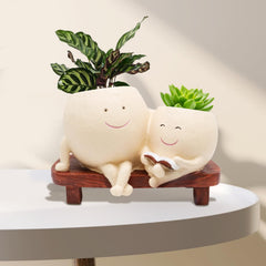 LAUGOKOBE front view smiling face planter showcasing cheerful decor