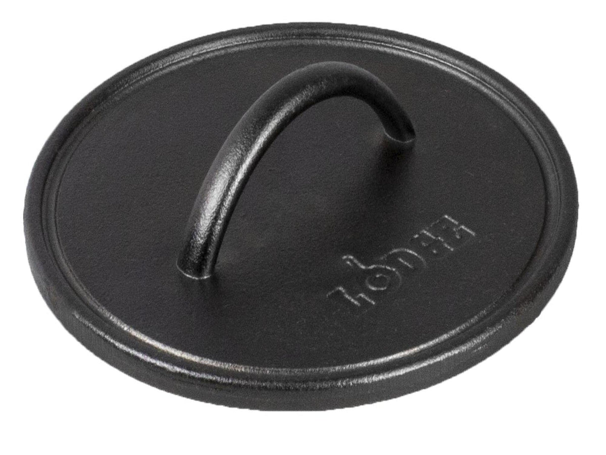 Lodge cast iron press front view showing solid build and easy seasoning benefit