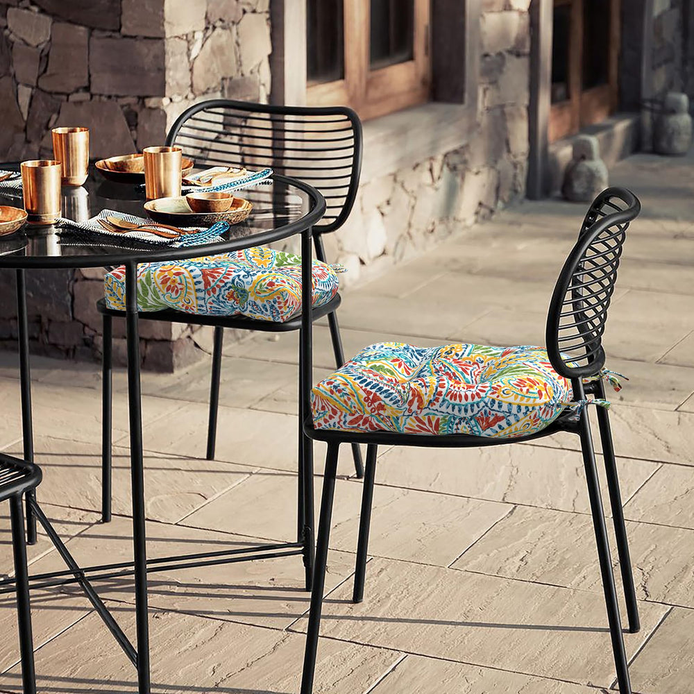LVTXIII cushion tied to wicker chair on patio preventing slipping