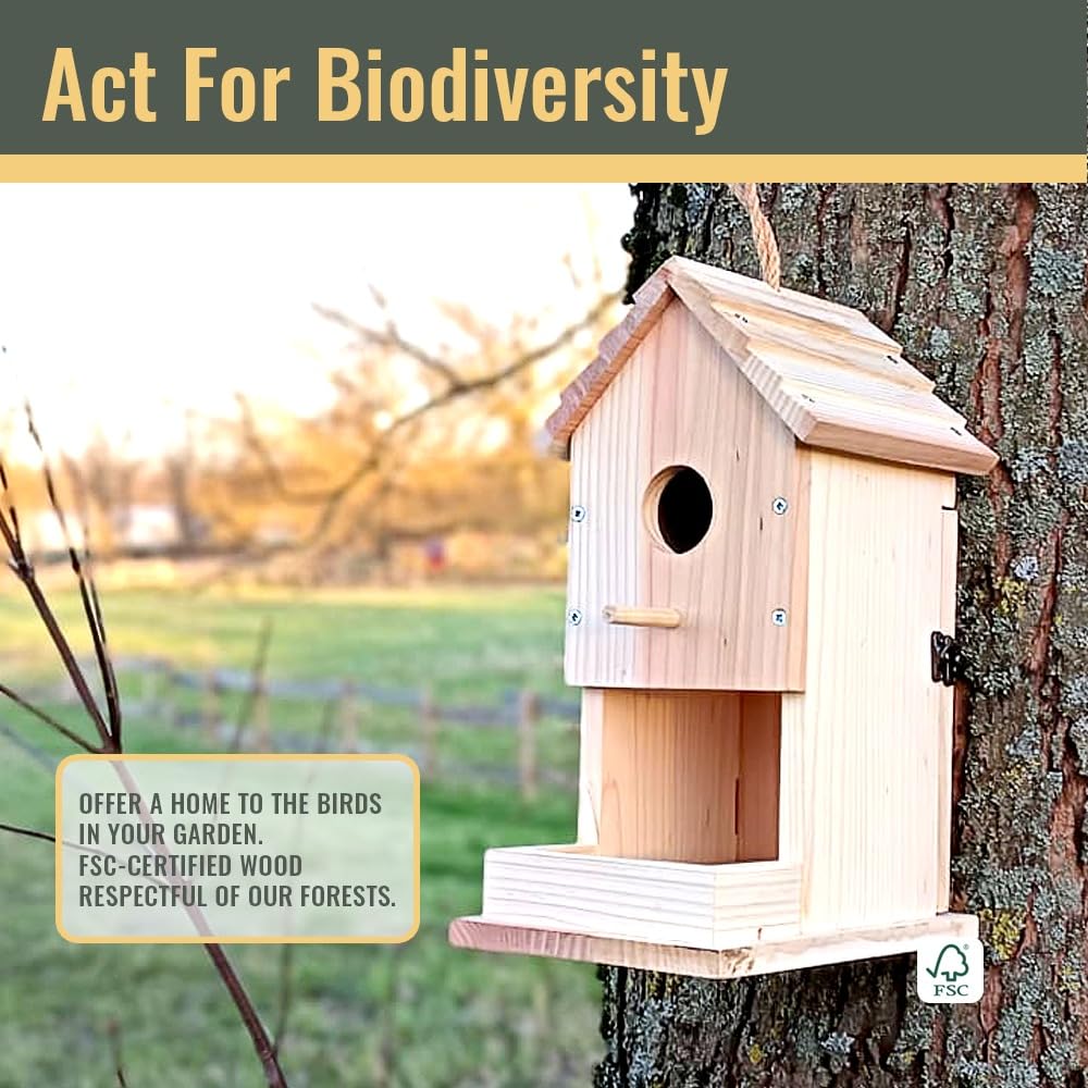 Maboko birdhouse next to book showing scale and compact outdoor size