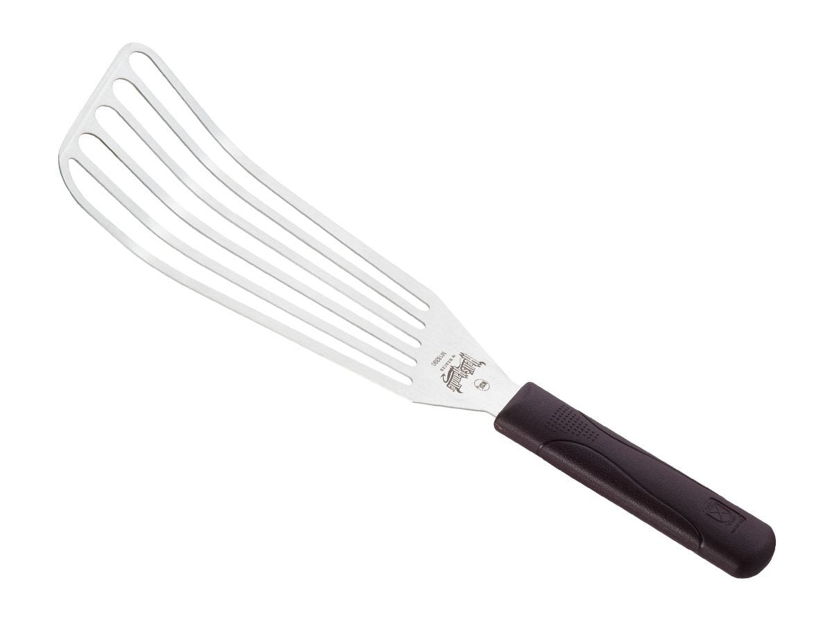 Mercer Culinary Hell's Handle in use flipping fish on a hot grill for confident high-heat control