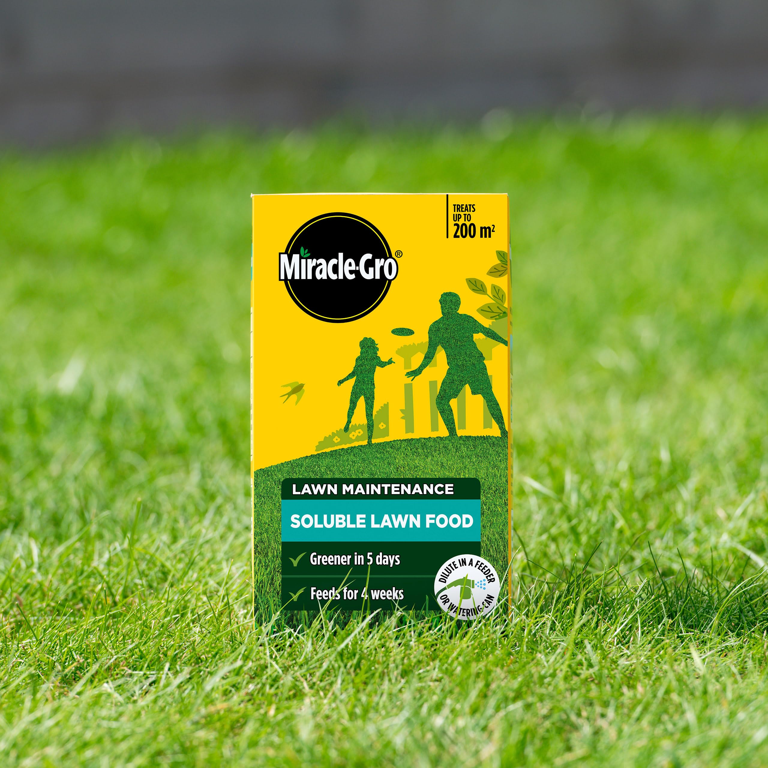 Miracle-Gro being mixed in a watering can for quick application