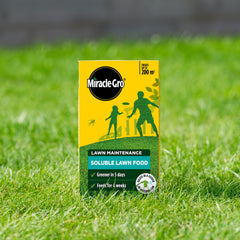 Miracle-Gro being mixed in a watering can for quick application