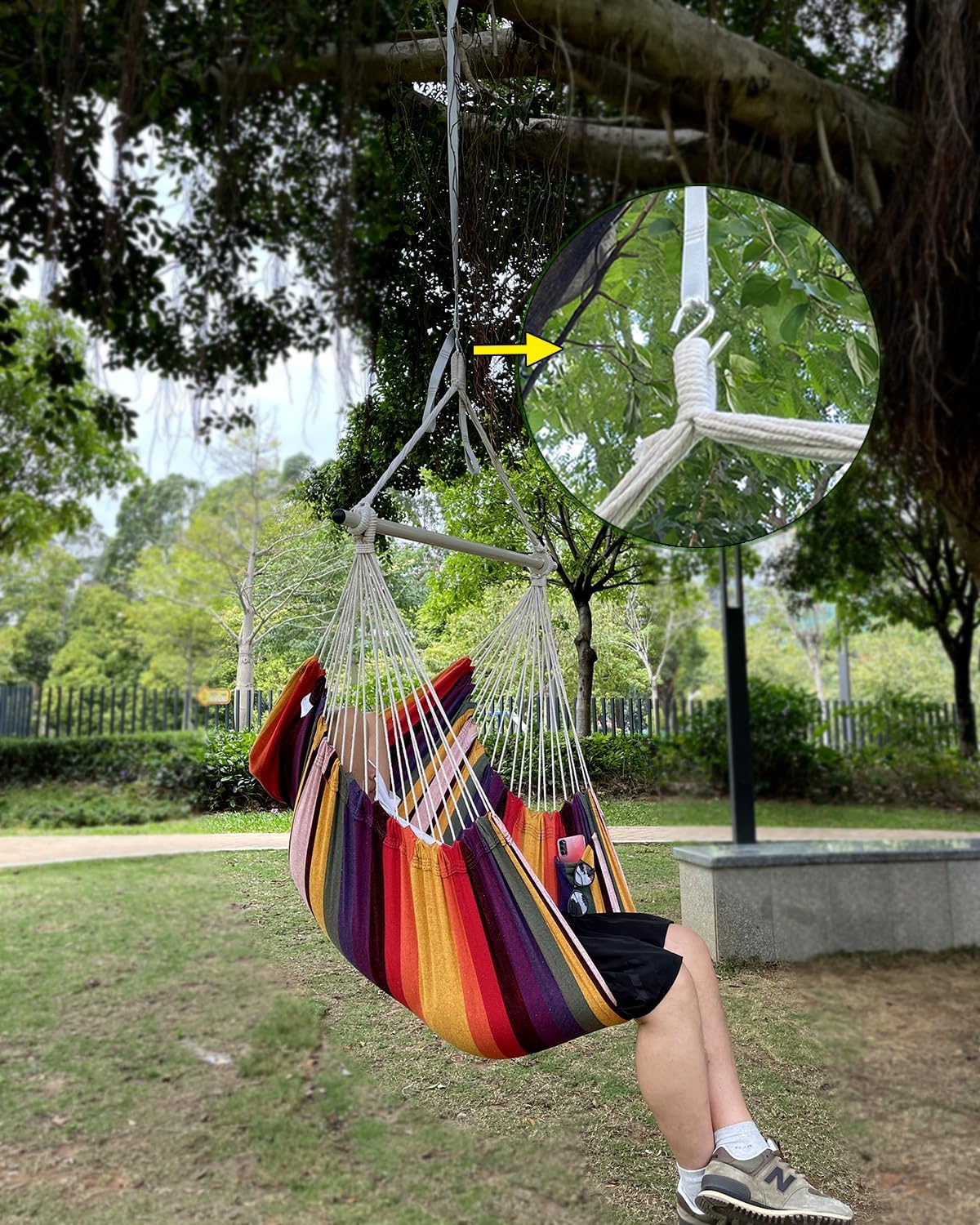 MIZTLI chair with person for scale showing generous dimensions and roomy comfort