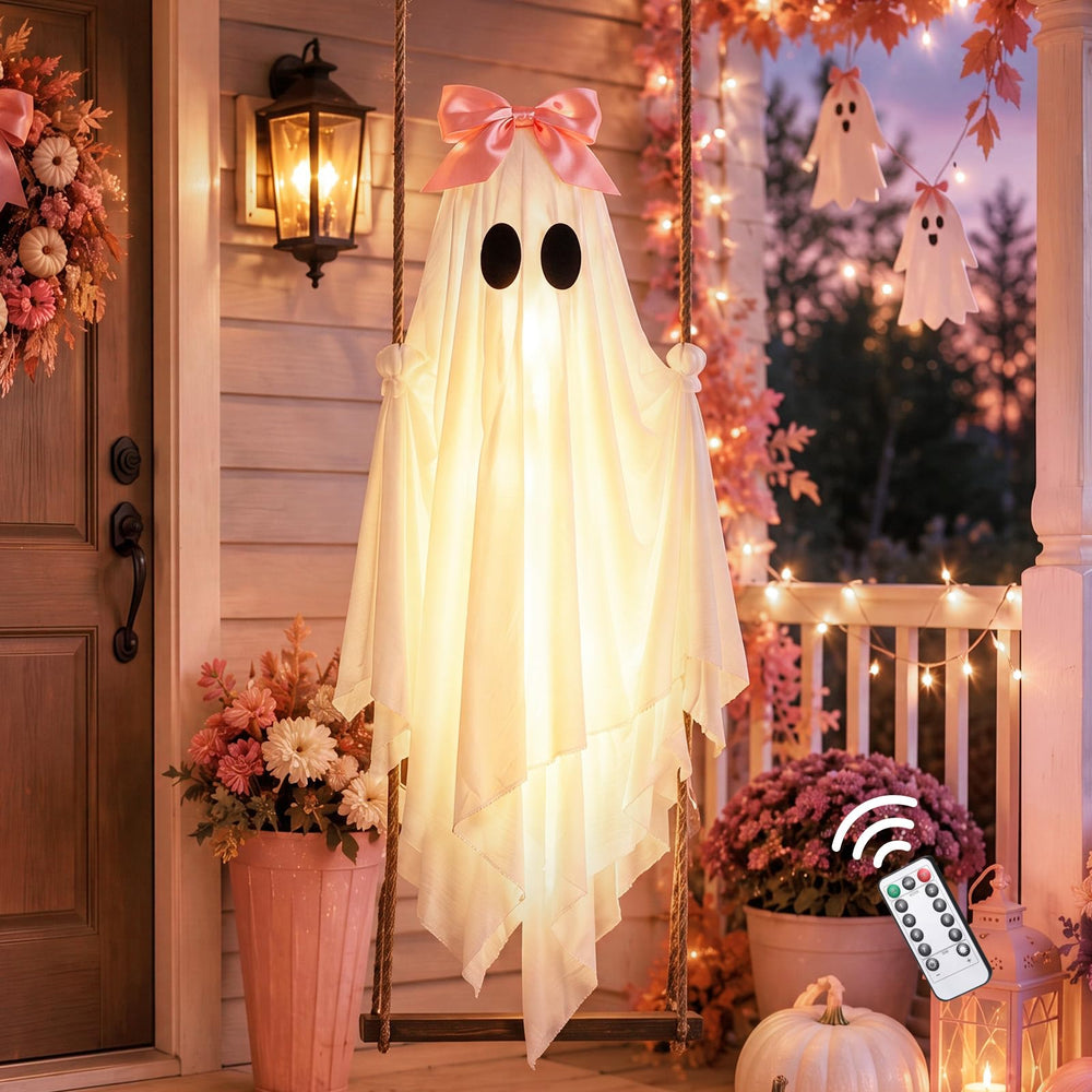 Motionchic front view pink bow ghost on swing showing festive curb appeal